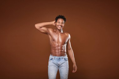 Fit african man with naked torso.