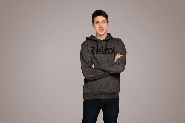 Portrait Handsome Teenage Boy Hoodie Posing Gray Background Studio Shot — Stock Photo, Image