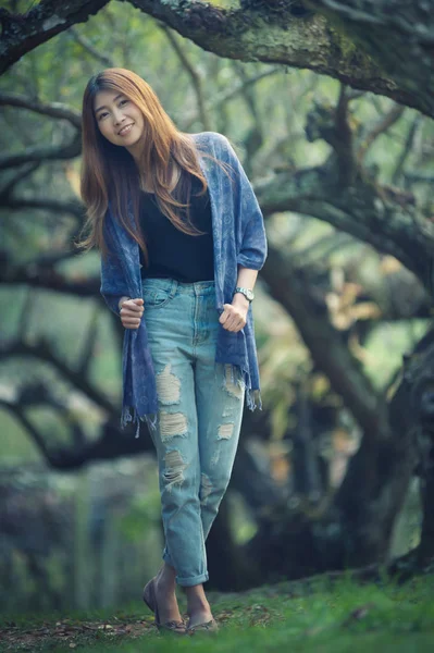 asia beautiful woman on plum tree park at doi angkhang mountain