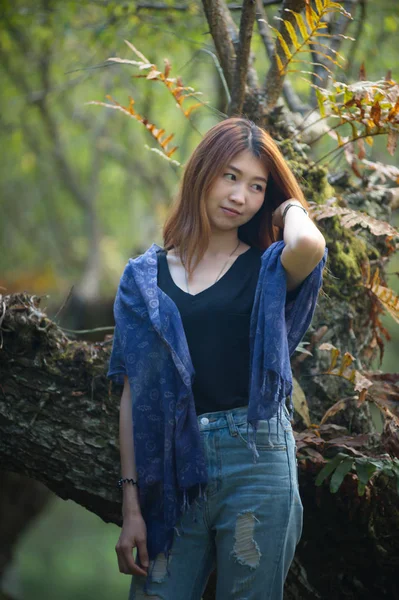 asia woman standing on Plum Garden doi angkhang mountain thailan