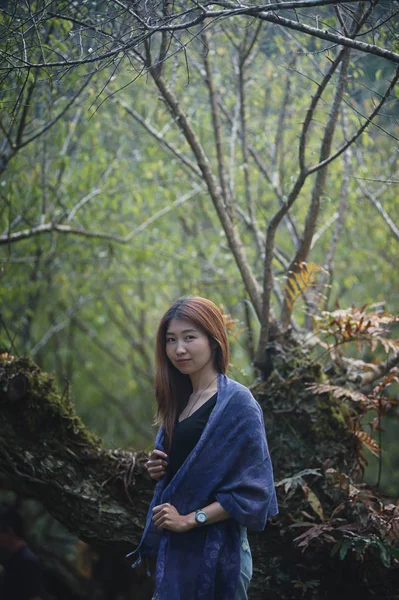 asia woman standing on Plum Garden doi angkhang mountain thailan