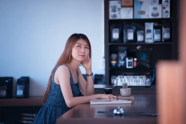 portrait of asia happy woman in cafe