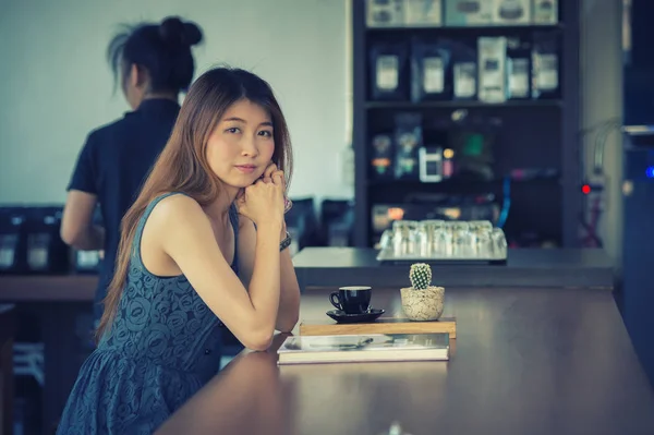 portrait of asia happy woman in cafe