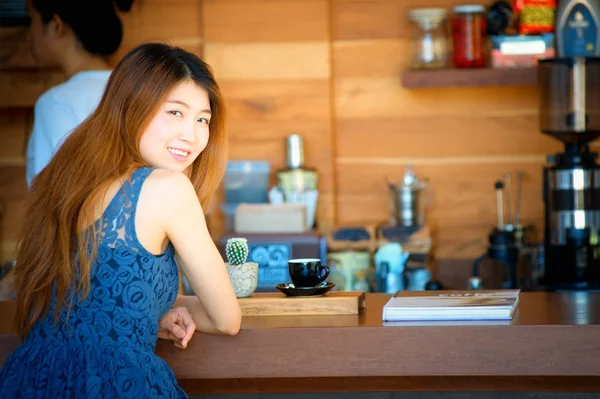 portrait of asia happy woman in cafe