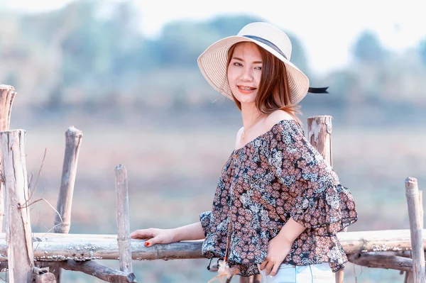 asia woman in summer fashion standing on sun