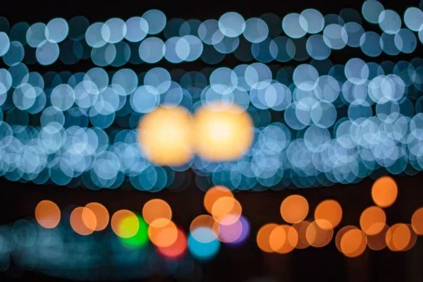 Luzes embaçadas fundo bokeh da festa da noite . — Fotografia de Stock