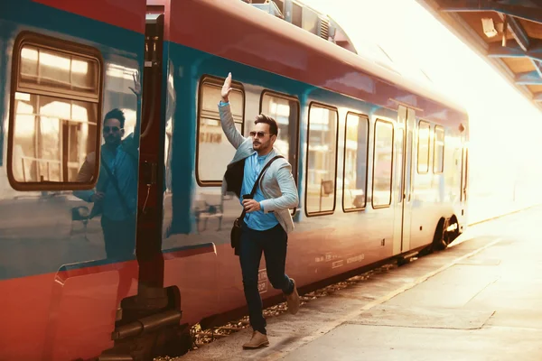 Businessman on railroad station — Stock Photo, Image