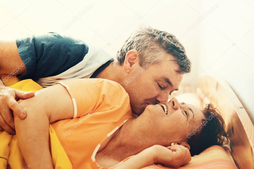 Senior couple in bedroom