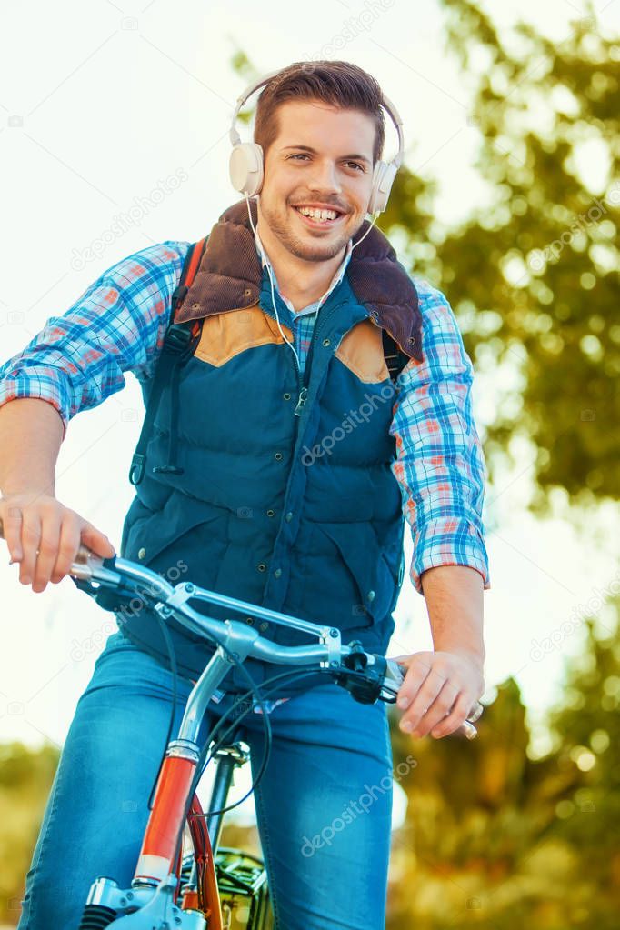Young Man Riding a Bike