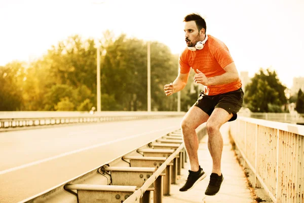 Man exercise on the bridge — Stock Photo, Image