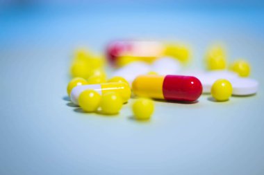 colorful pills close up on a light background