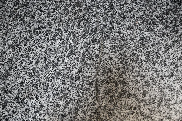 Granit aus grauem Stein. lizenzfreie Stockbilder