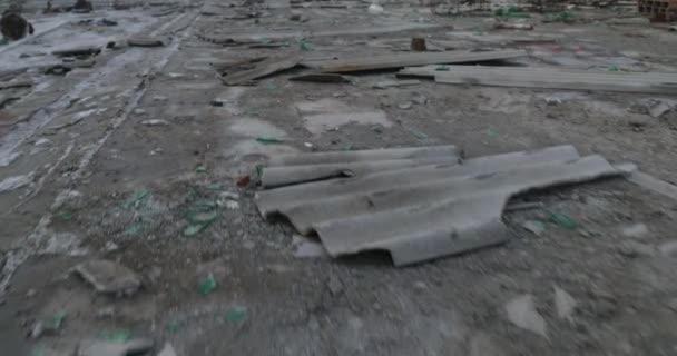 Panning from dirty street texture to panoramic view of demolished city landscape. Discovering entire town constructions ruined and made rubble. Epecuen, Buenos Aires, Argentina. — Stock Video