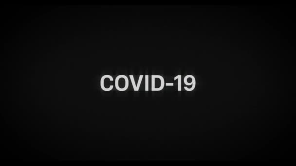 Covid-19片名动画，有闪失效果和红色通道偏移。老电视质感和活力。大流行病致命病毒新闻. — 图库视频影像