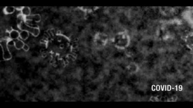 Coronavirus COVID-19 metin ve mikroskop görüntüsü sağ altta titreşim ve metin ile siyah beyaz, eski bir TV efekti olduğunu gösteriyor.