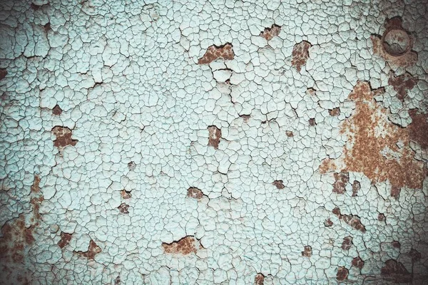 Blue paint flaking and cracking texture on rusty metal. — Stock Photo, Image