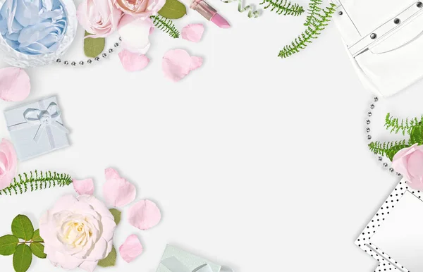 White feminine background. Flat lay. Pink roses, mirror, white bag. Place for text. Cheerful mind every day.