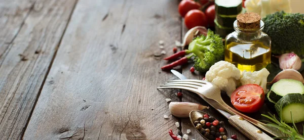 Fresh vegetables, olive oil and spices — Stock Photo, Image