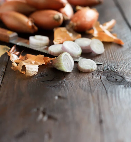 Organic  onion on wooden table — Stock Photo, Image