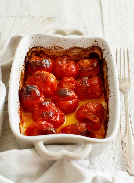 Roasted cherry tomatoes casserole — Stock Photo, Image