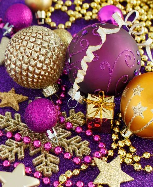 Golden and purple Christmas decorations — Stock Photo, Image