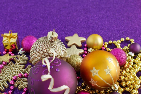 Golden and purple Christmas decorations — Stock Photo, Image