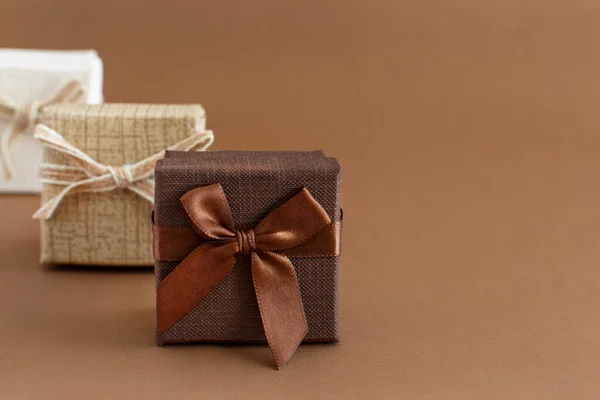 Brown tones gift boxes on a brown background — 스톡 사진