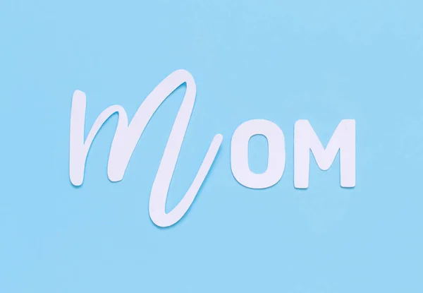Text Mom Light Blue Background Top View — Stock Photo, Image