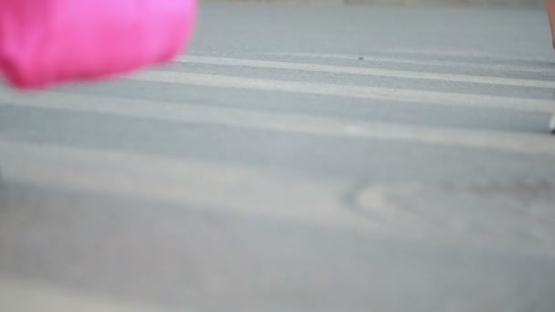 Foot crosswalk. People cross the road. feet walking on the pavement. — Stock Video