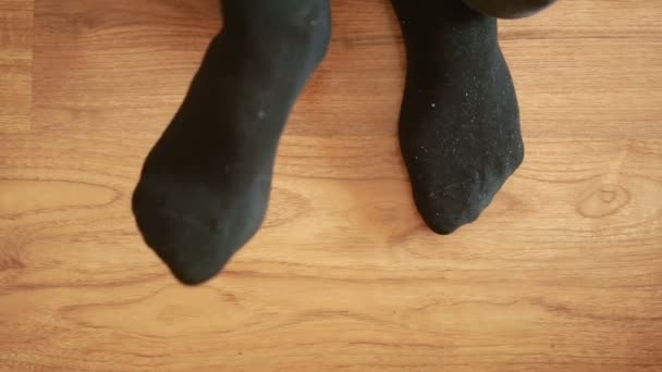 Man putting socks. man removes socks. close-up — Stock Video