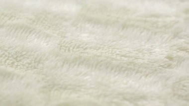 Arka plan veya doku için beyaz kürk. sıcak battaniye