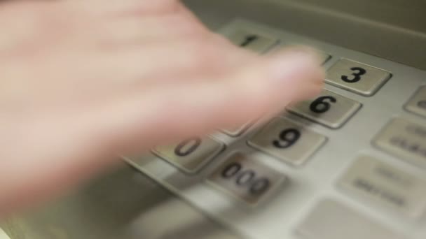 Woman hand touching ATM machine. gaining password. — Stock Video