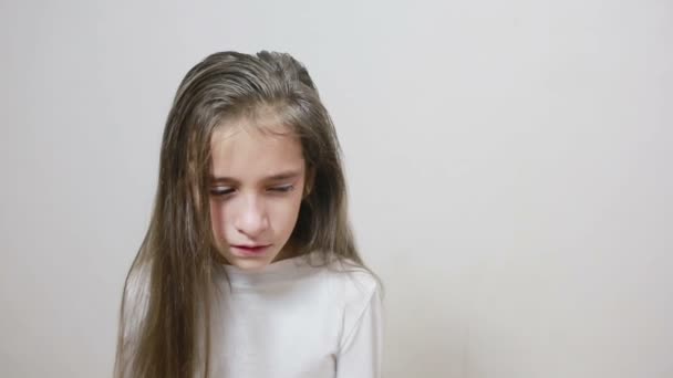 Little girl crying with tears rolling down her cheeks — Stock Video
