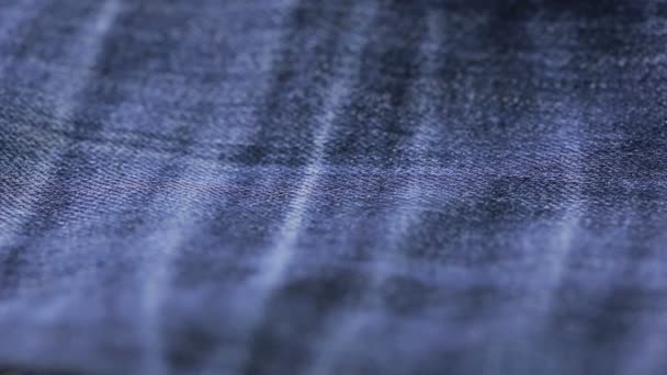 Blue jeans texture. can use as background. close-up of denim — Stock Video