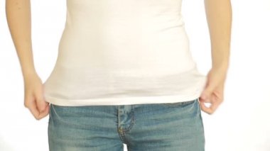 Kadın şişko göbek. Fazla kilolu ve ağırlık kaybı kavramı. kız mide çeker