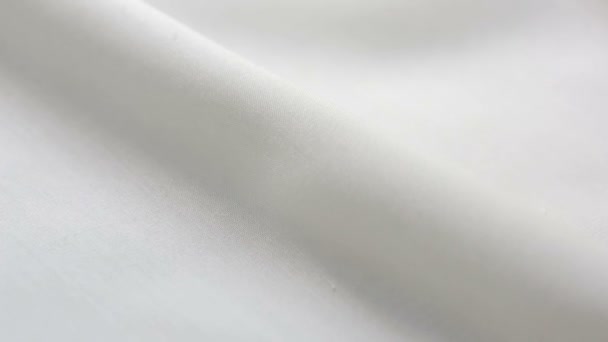 Textura de tela de algodón blanco. Se puede utilizar como fondo — Vídeos de Stock