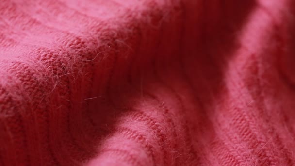 Czerwony wełniany sweter czesankowa wzór. można użyć jako tła. — Wideo stockowe