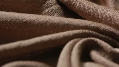 Bol dökümlü Simli kumaş. Kumaş dokusu. Arka plan olarak kullanılabilir