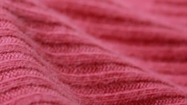 Kırmızı yün kamgarn kazak modeli. arka plan olarak kullanabilirsiniz.