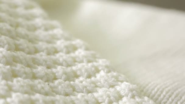 White knitted wool texture. use as background. close-up — Stock Video