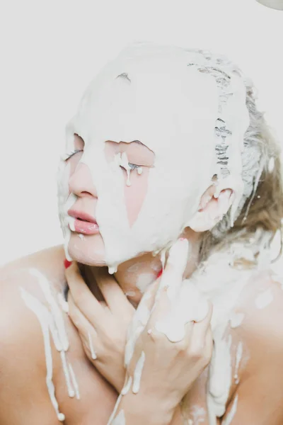 Woman portrait with flowing white paint and face art — Stock Photo, Image