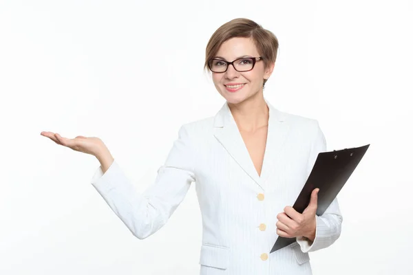 Young attractive businesswoman. She is holding her hand raised — Stock Photo, Image