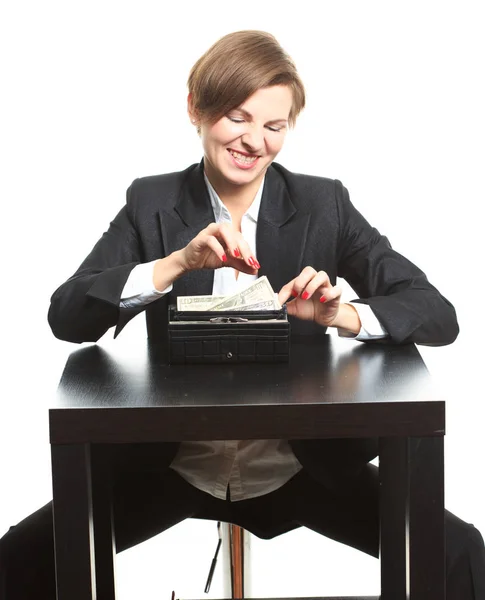 Mujer tomando dinero del bolso — Foto de Stock