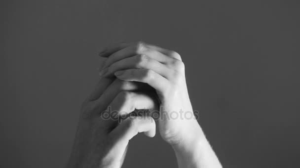 Close up man and woman hand touching holding together on blurred background. — Stock Video