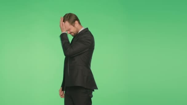 Businessman on a green background, gesture chagrin. body language. hromakey, — Stock Video