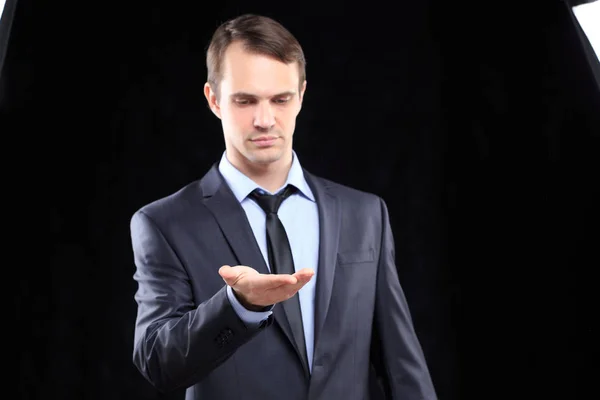 Executive man touching an imaginary screen — Stock Photo, Image