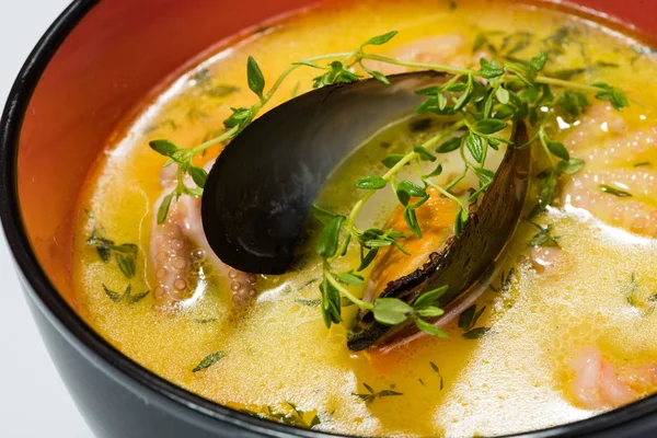 Hot and sour seafood soup,