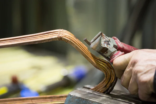 Repairing transformer and welding copper wire — Stock Photo, Image