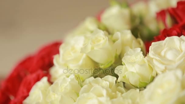 bright colorful bouquet of red and white roses, close-up