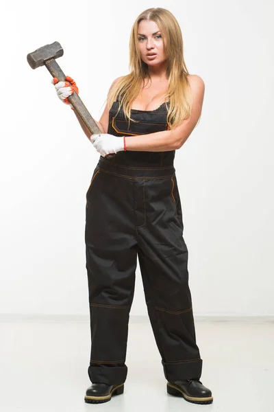 Nice sexy woman mechanic holding wrench isolated over white background — Stock Photo, Image